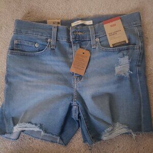Levi Woman Mid length ripped Jean shorts Size 27